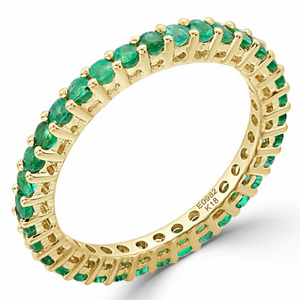 gold ring made of line of emerald gems