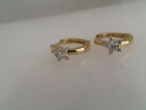 Sabrina 14k yellow gold diamond star huggie earrings .23tw