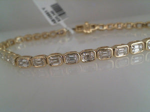 Sabrina 14k yellow gold bezel set emerald cut diamond bracelet 4.56tw