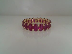 RGE 14k yellow gold oval shaped ruby eternity band 6.23tw