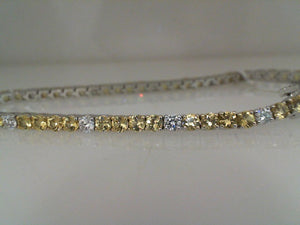 LBL 13k white gold yellow sapphire and diamond tennis bracelet .93/4.8