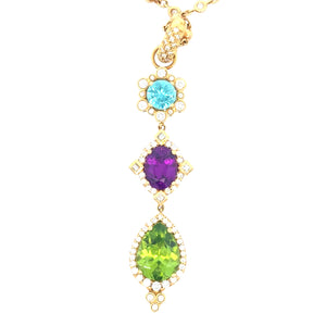 Erica Courtney 18k yellow gold triple drop pendant featuring blue zirc