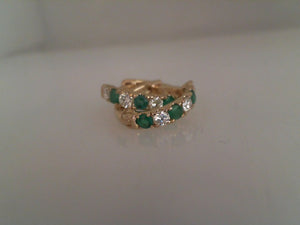 Sabrin 14k yellow gold diamond and emerald huggies