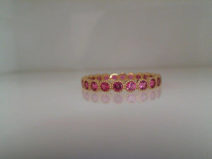 Erica Courtney 18k yellow gold bezel set pink sapphire band
