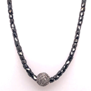 Chunky rectangle bead-like diamond necklace featuring a sphere of diamonds 