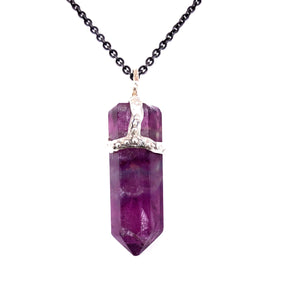 Brilliant Purple Fluorite crystal attached to necklace by handmade silver "crown" that also features inset gems