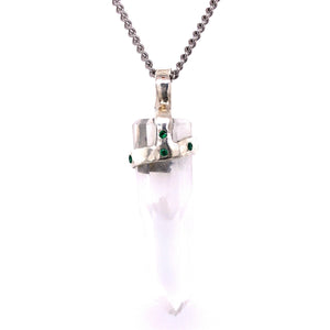 Clear quartz crystal attached to necklace by handmade silver "crown" that also features inset gems